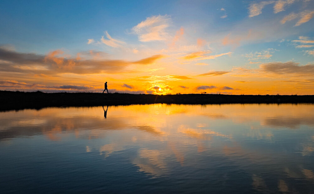 A Solitary Walk Into the Sunset