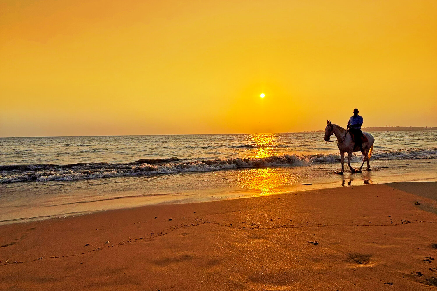 The cowboy and the fiery sunset