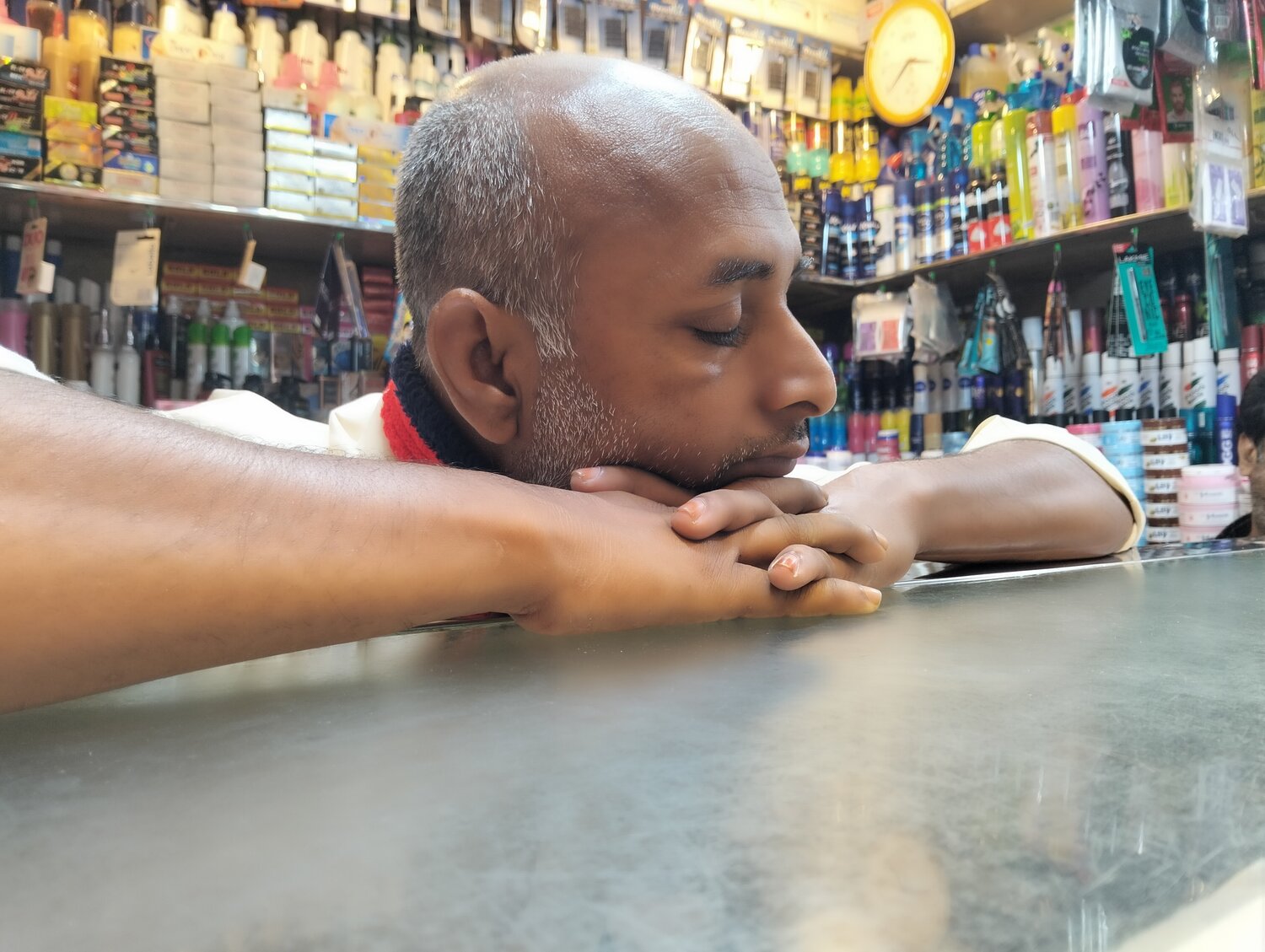 The Quiet Pause: A Shopkeeper\'s Rest