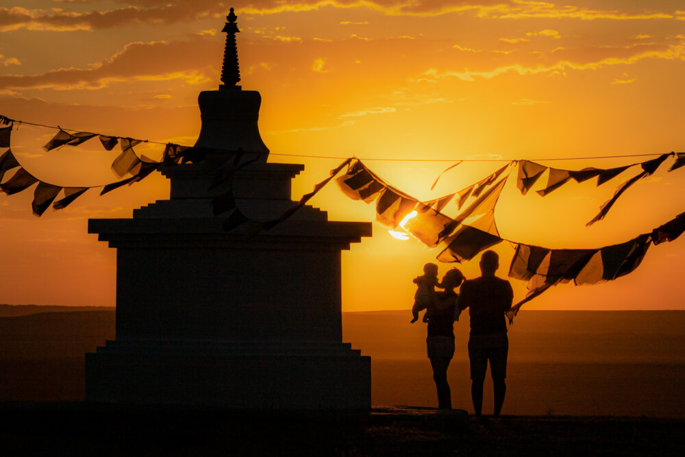 Family in the embrace of a warm sunset