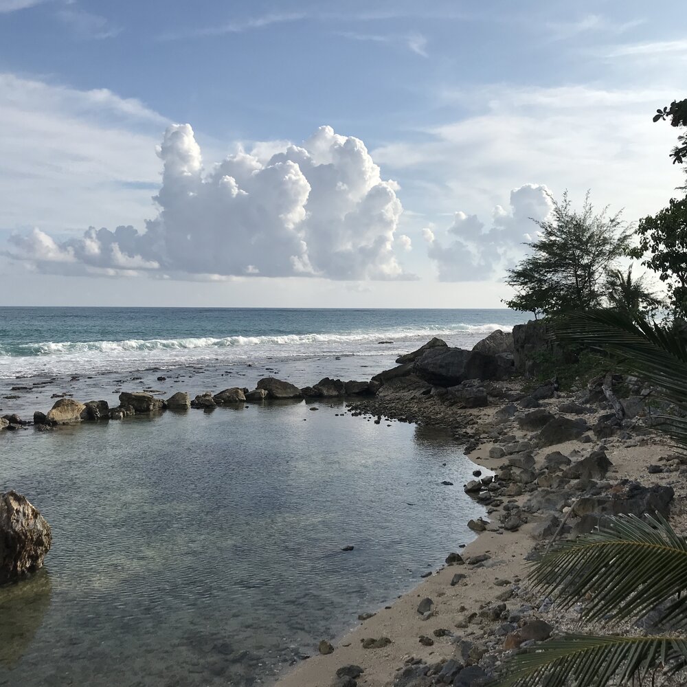 Cumulus over calm waters