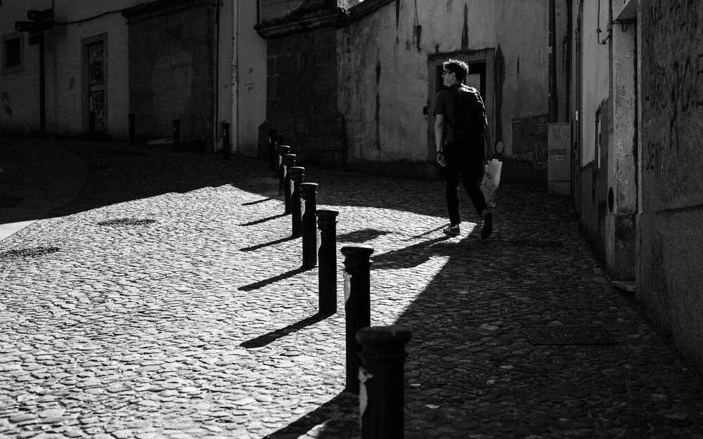 Walking Through Light and Shadow