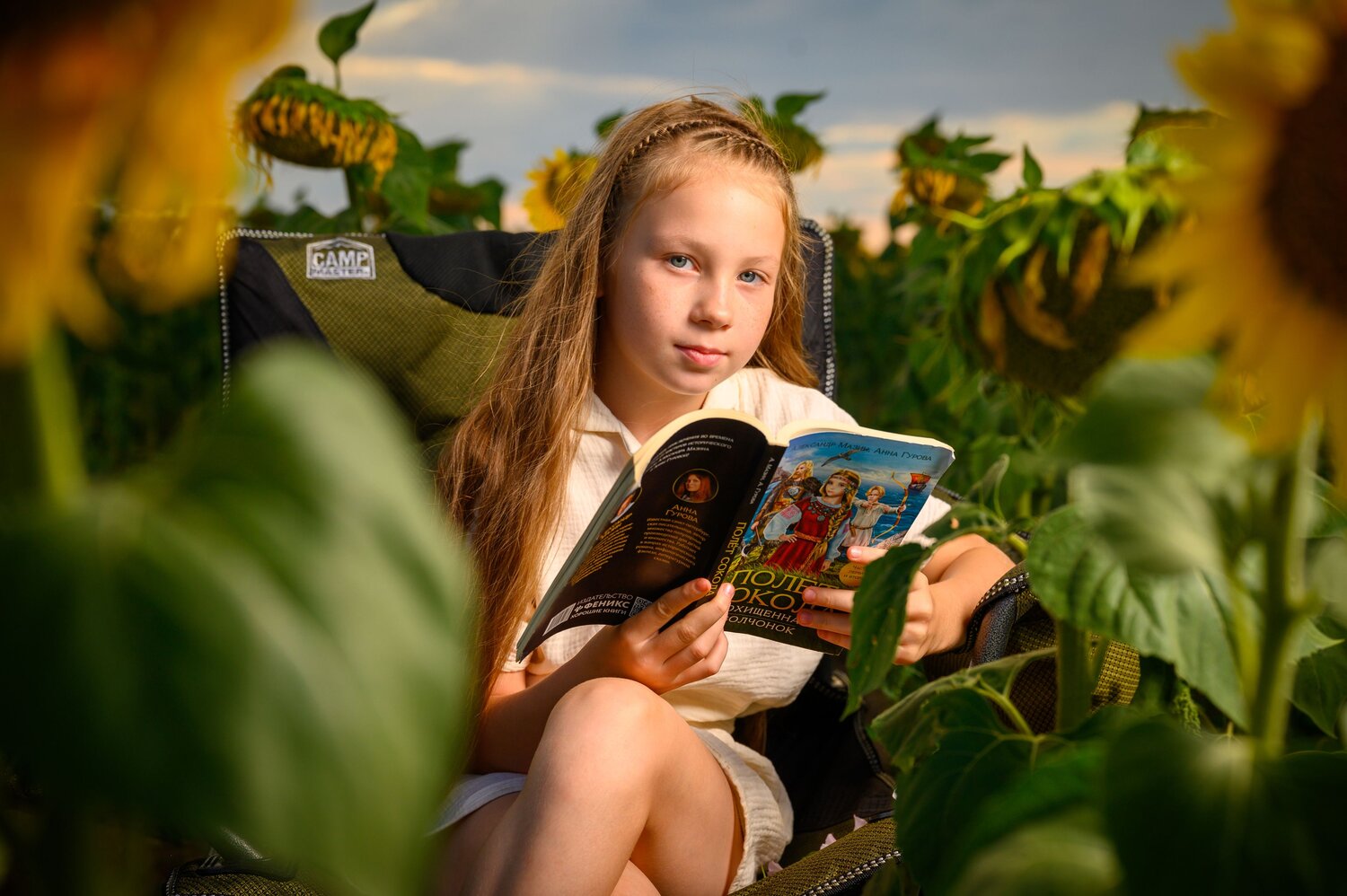 Summer, a book, and sunflowers