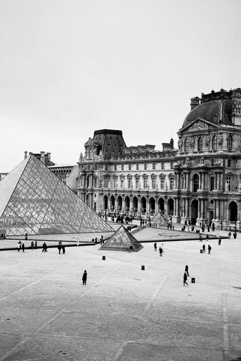 Title: “The Heartbeat of History: Louvre’s Inner Court”