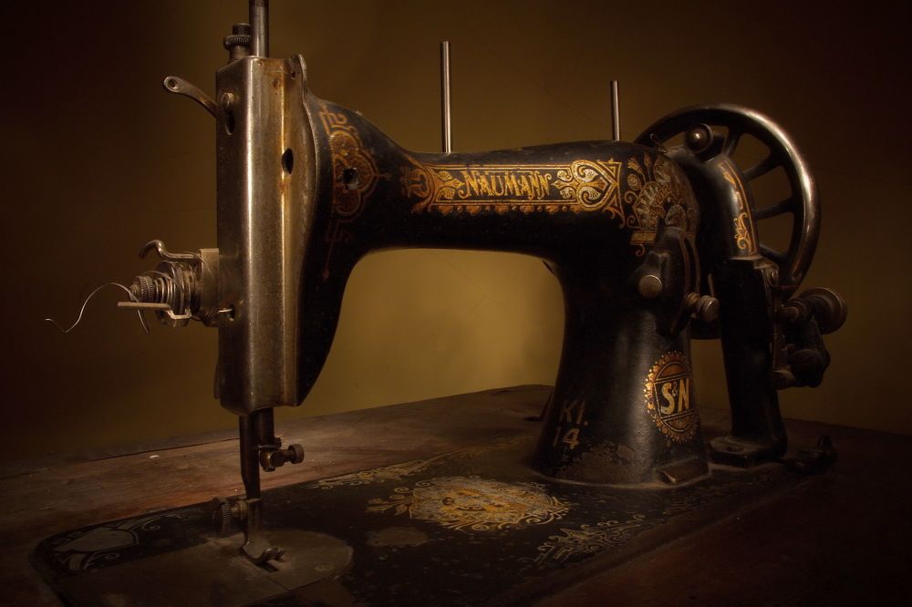 Who is waiting for Mr. Naumann?