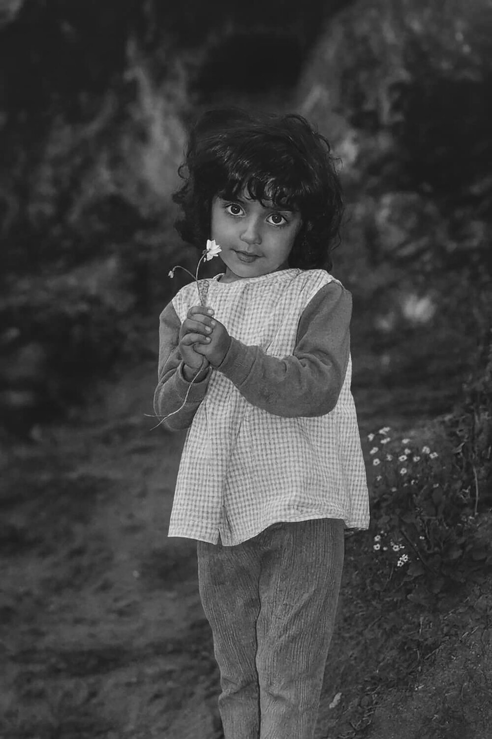 A girl with white flower