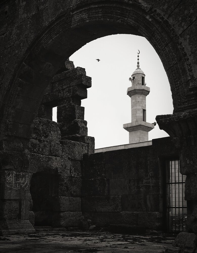 Witnesses of Time: Between Church Ruins and Minaret
