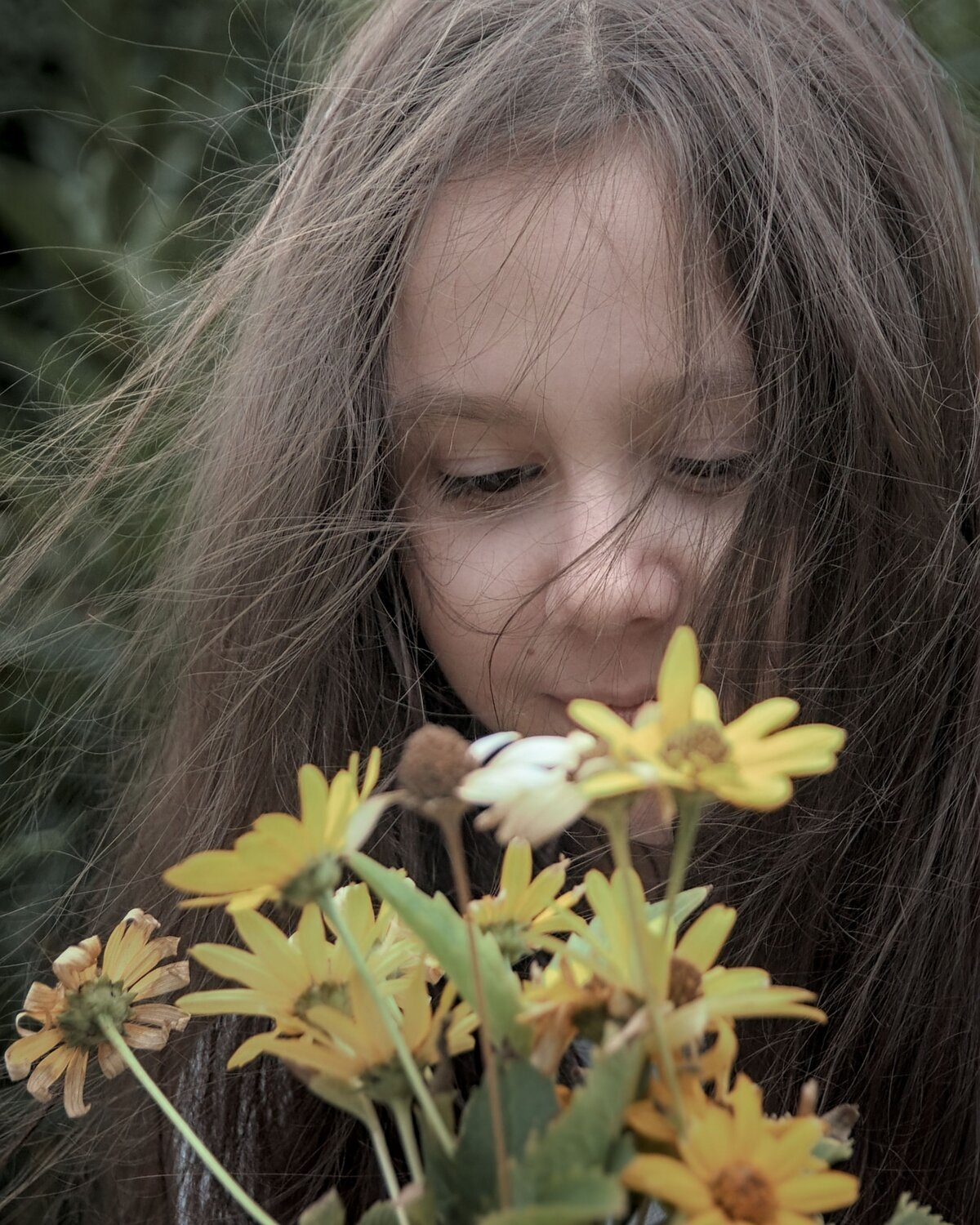 Children\'s portrait with autumn flowers