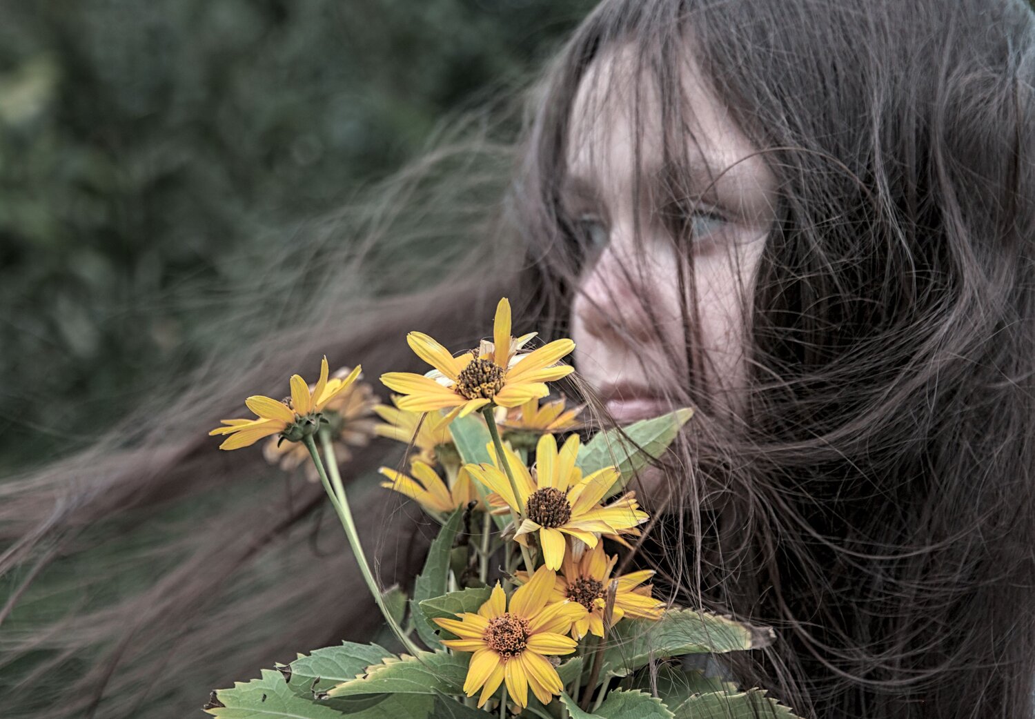 Children\'s portrait with autumn flowers and wind