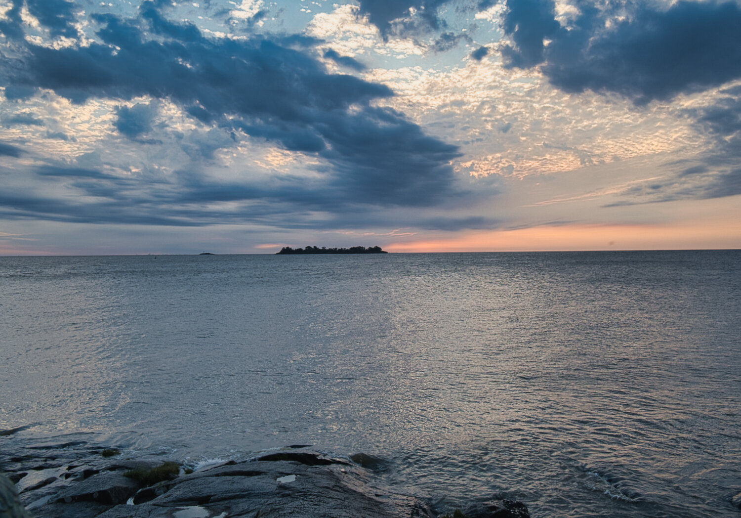 Island on the river at sunset