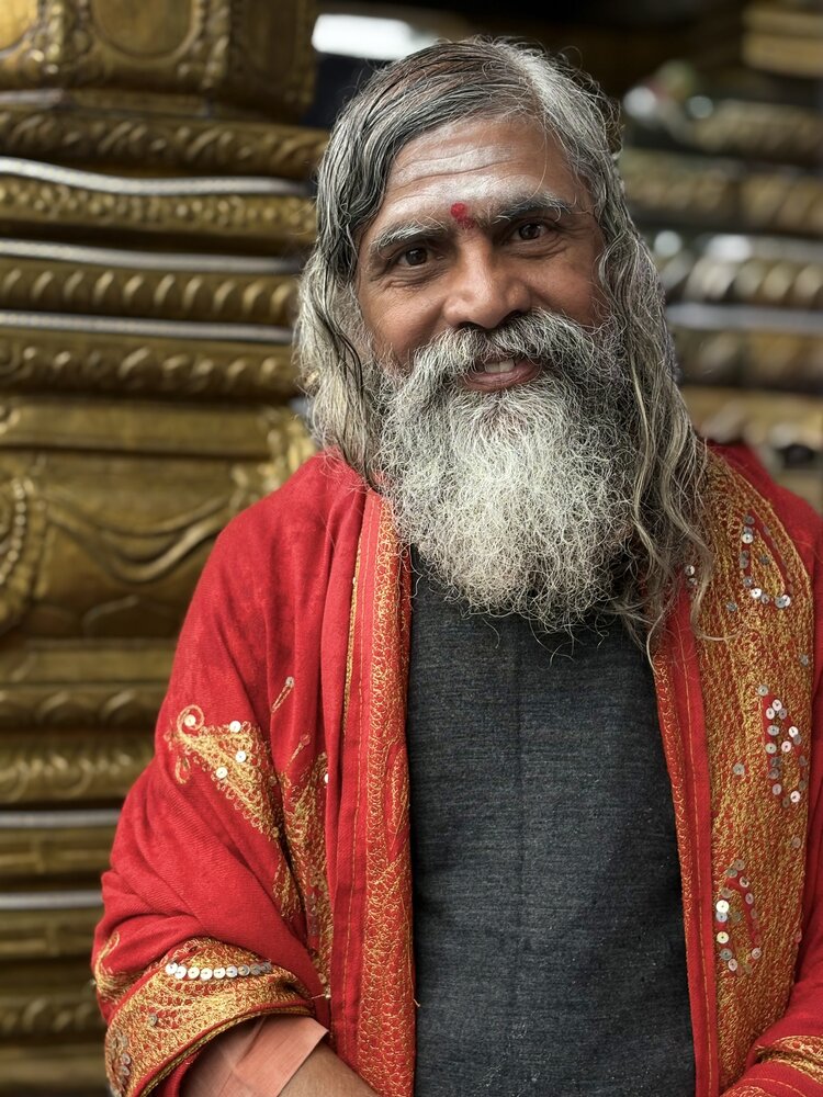 Elderly man celebrating in the rain during the Indra Jatra festival in  Nepal