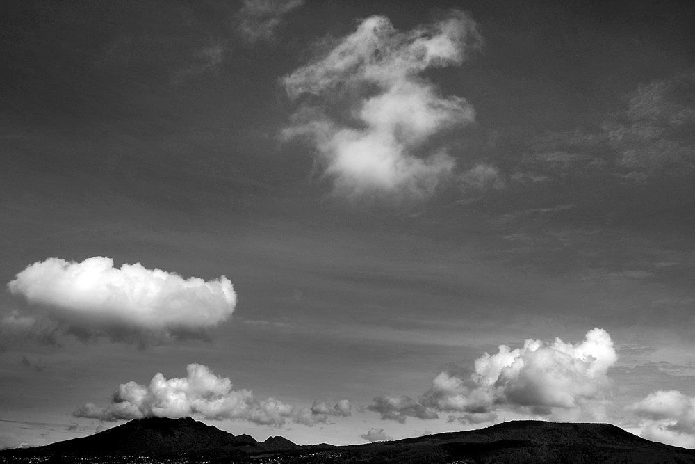 Two clouds above the mountain