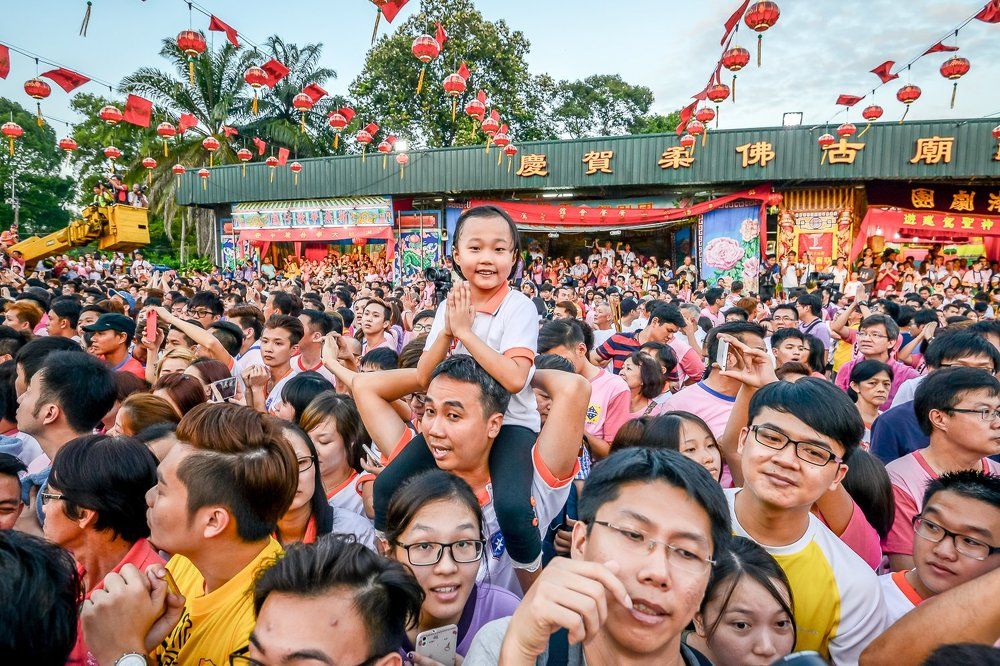 Little girl with crowd