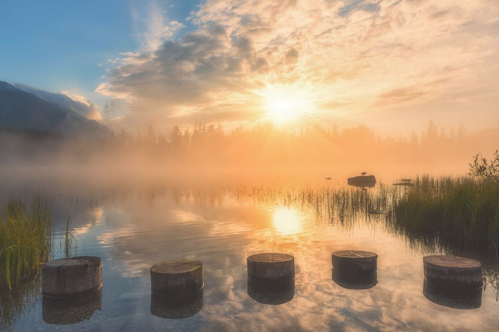 Foggy morning on the alpine lake
