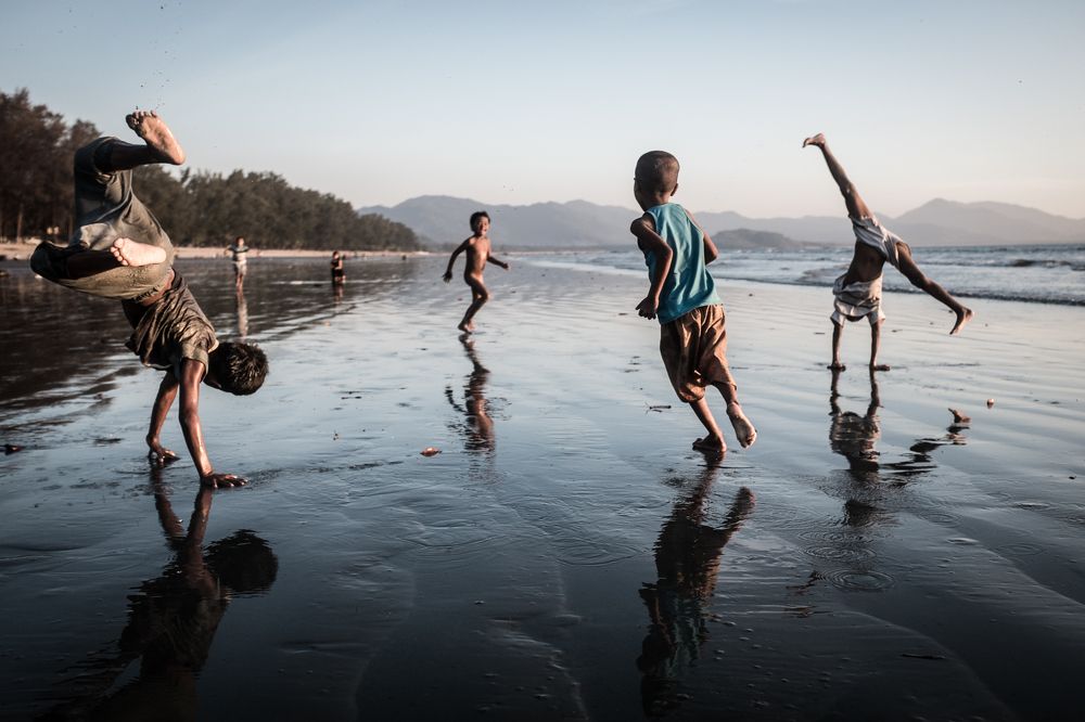 Kids playing at Dawei beach, Myanmar