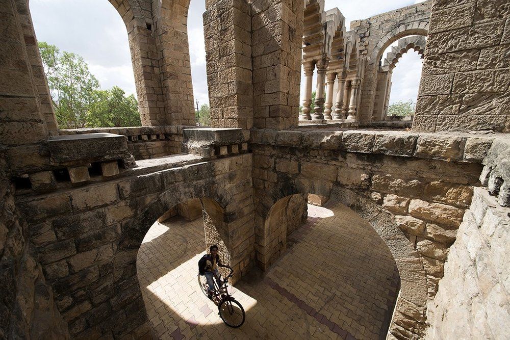 Cyclist at Hawa Mahal, Wadhwan