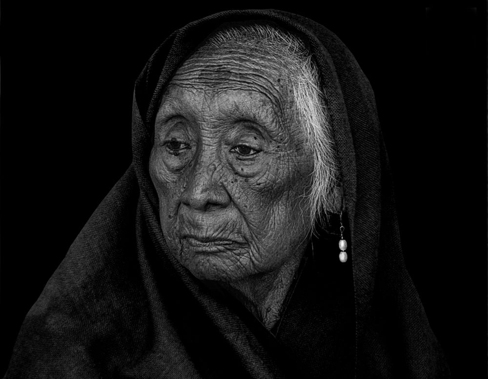 woman with a pearl earring