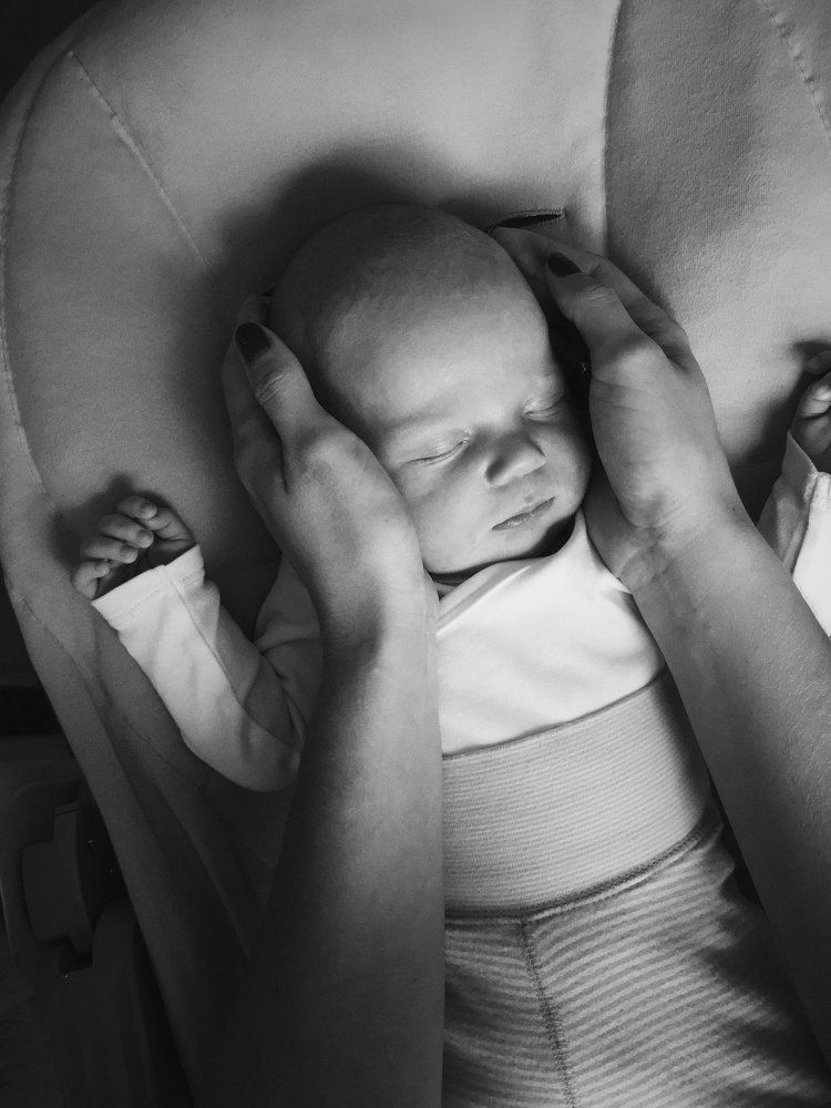 В руках матери