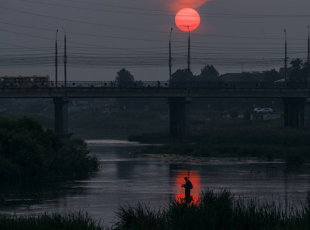 Рыбак на Упе