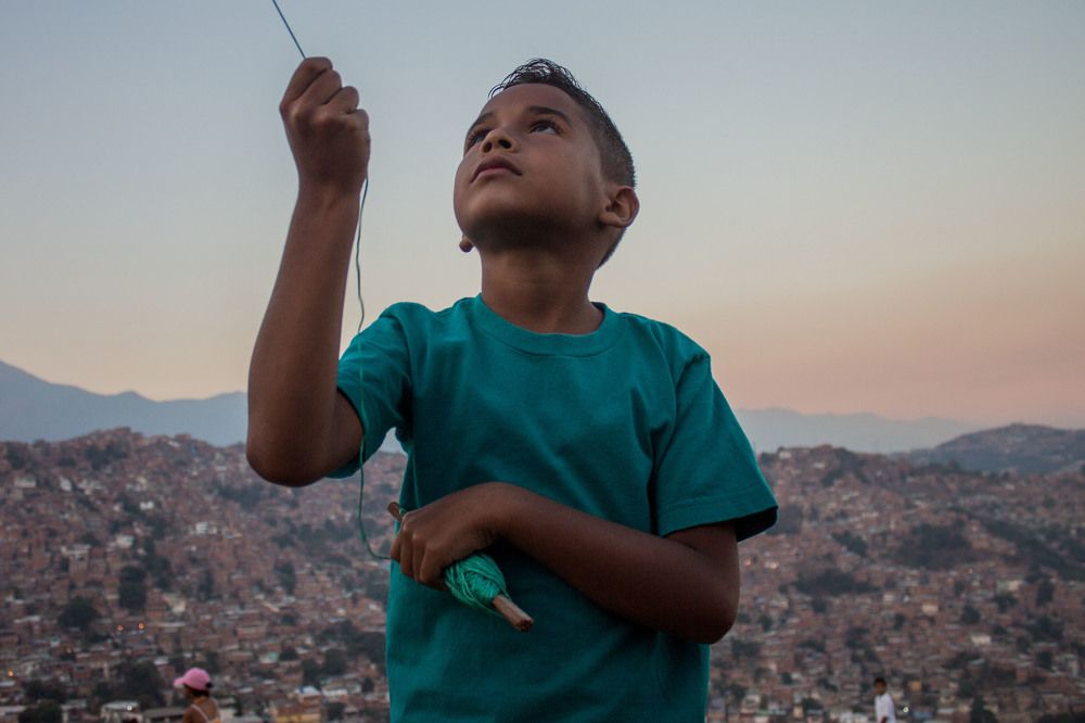 Kid flying a kyte