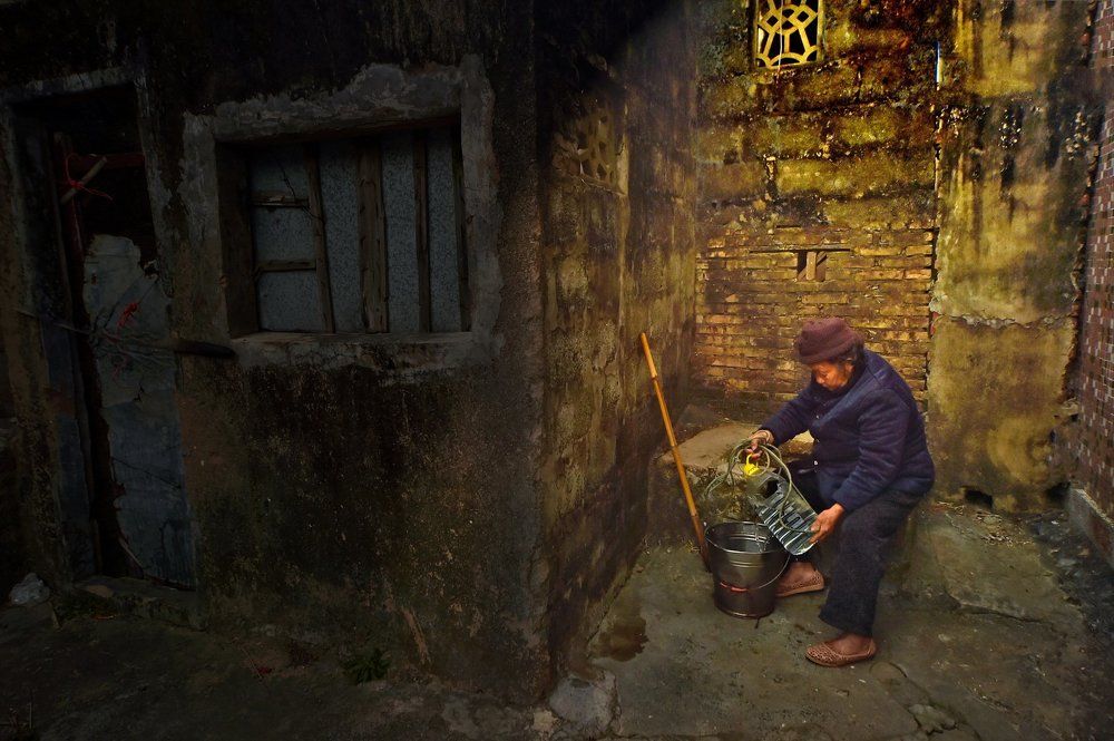 Old Women taking water