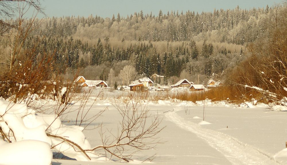 Заснеженная деревенька .
