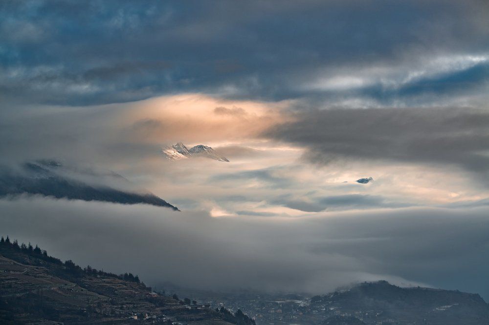 Укутан в облаках