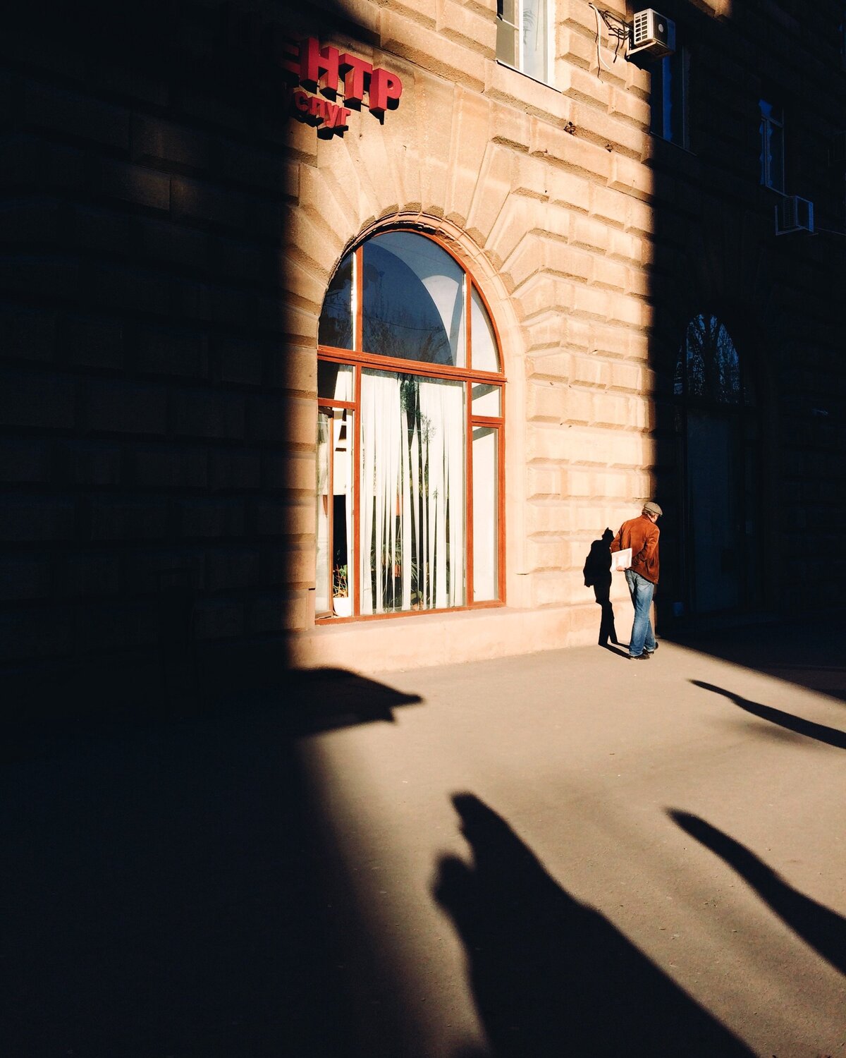 In the shadows.