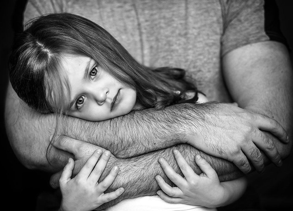 No fear in dad's arms.