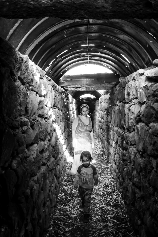 Madonna in ruinned bunker. Life is continue!