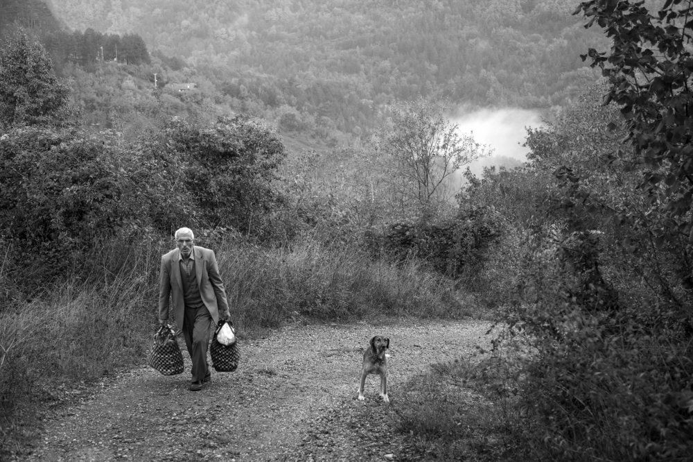 Peasant with his dog...