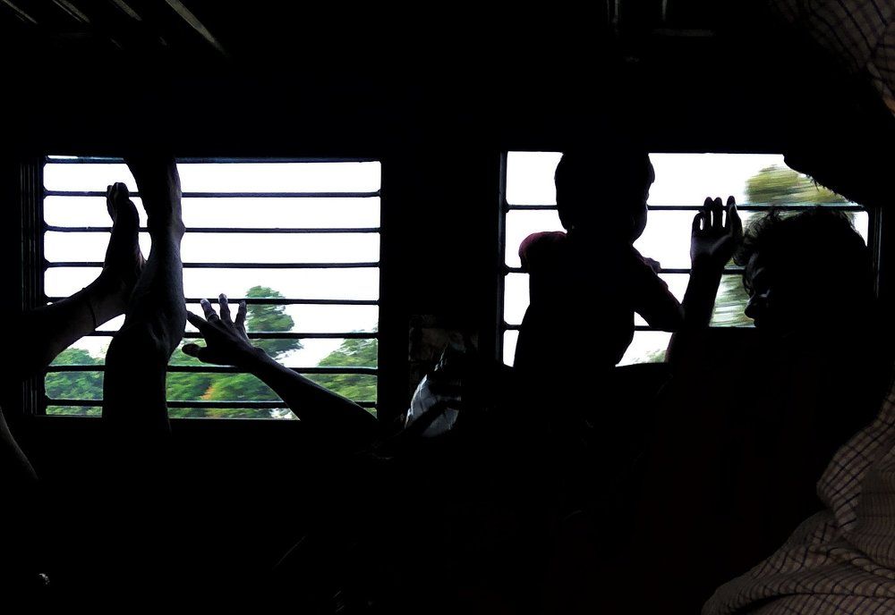 "playing with the shadows while travelling in general coach"