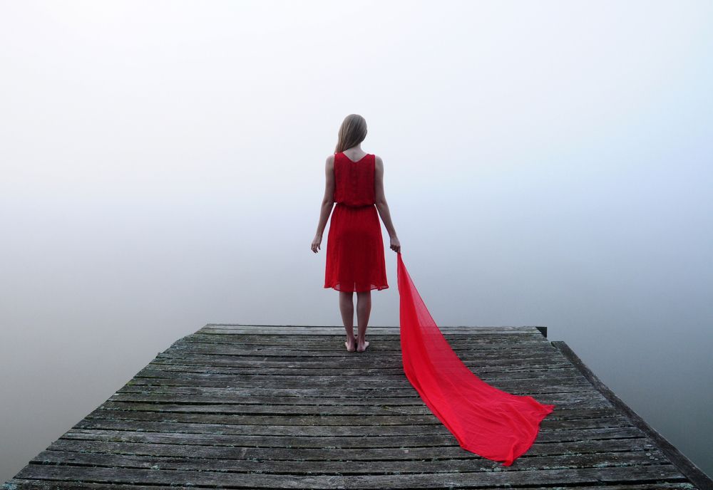 Woman in red on the egde