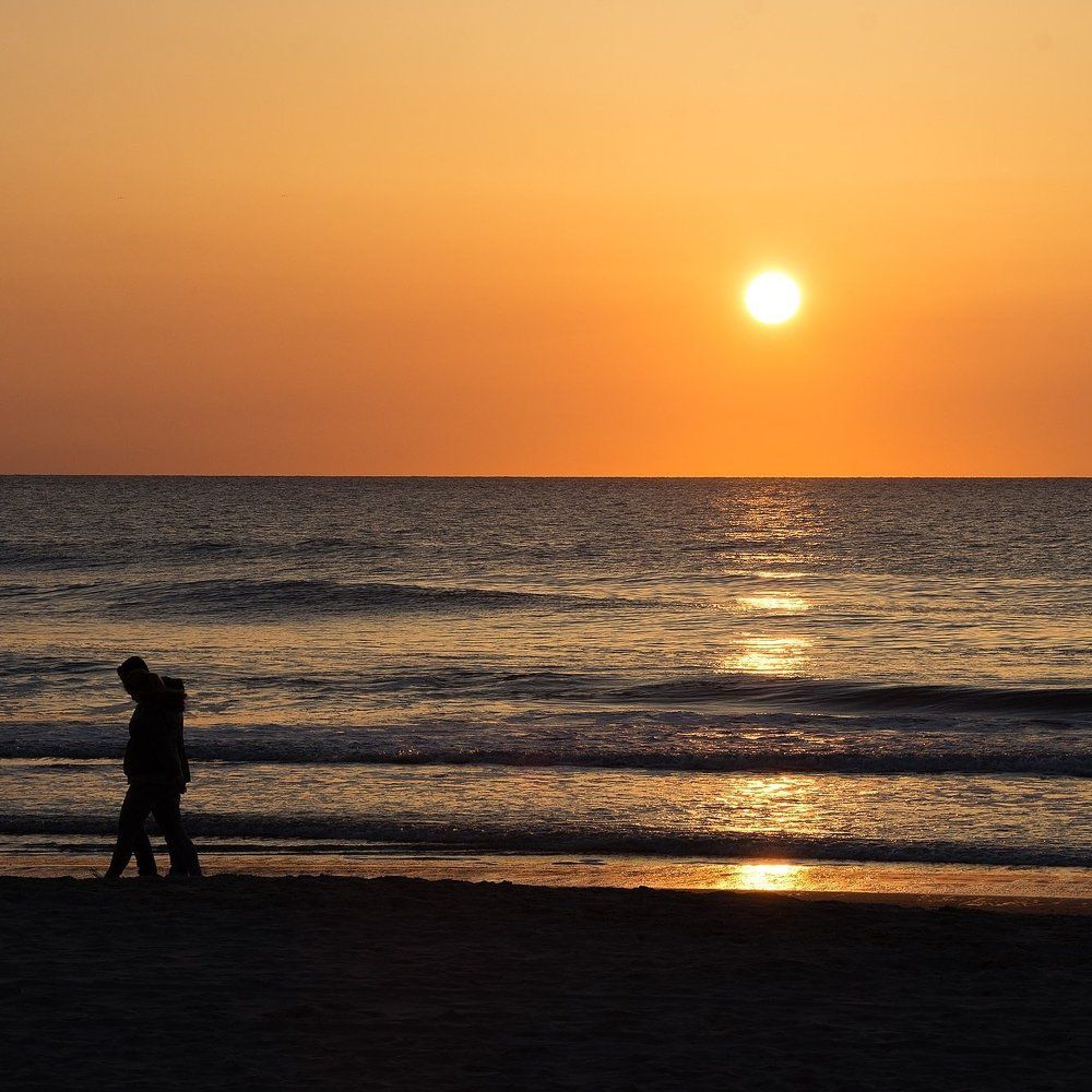 Walking at sunset
