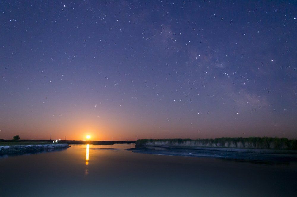 Milky way and rising Red moon