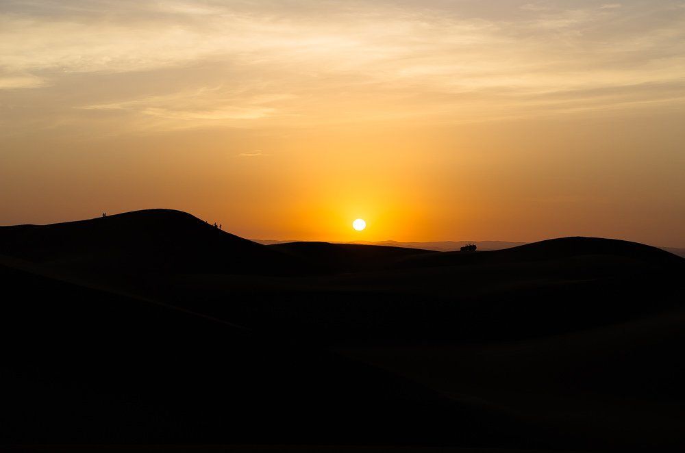 Perfect sunset at  the desert Huacachina