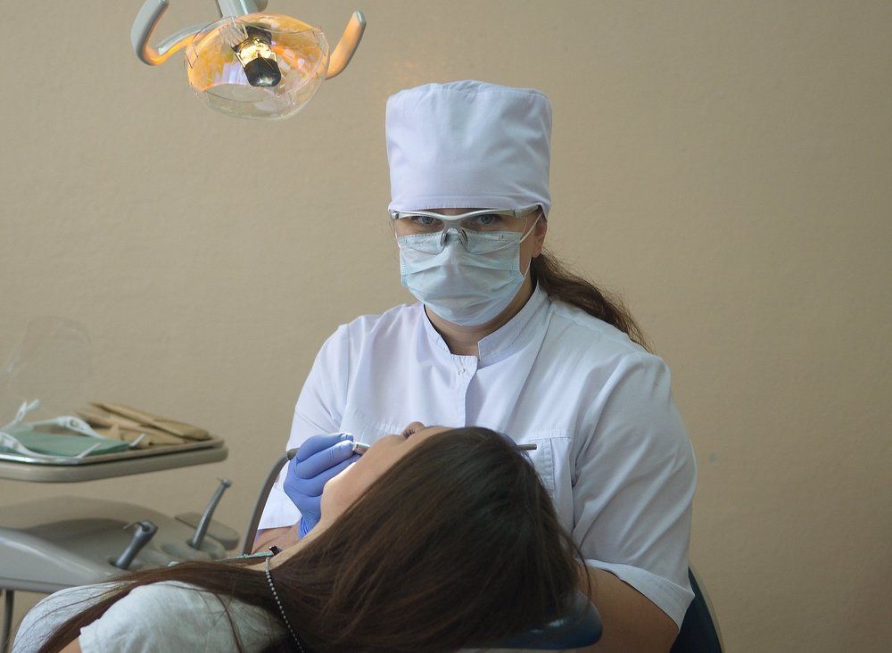 Стоматолог