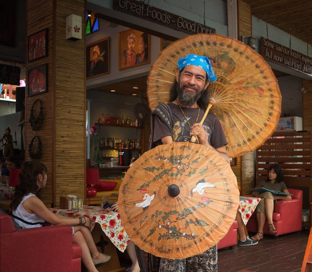 Продавец зонтиков