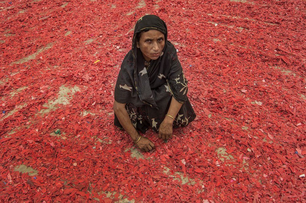 Woman working at wastage plastic factory