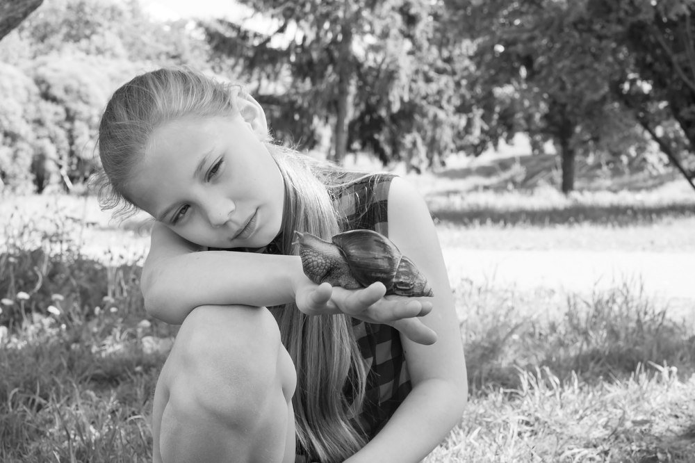 девочка с Ахатином