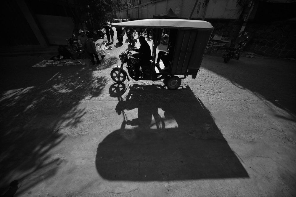 The Taxi In Shadow..