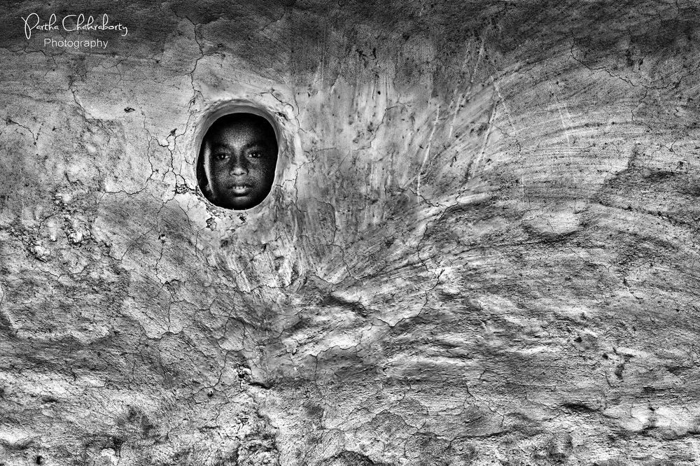 Peeping through a tiny round window