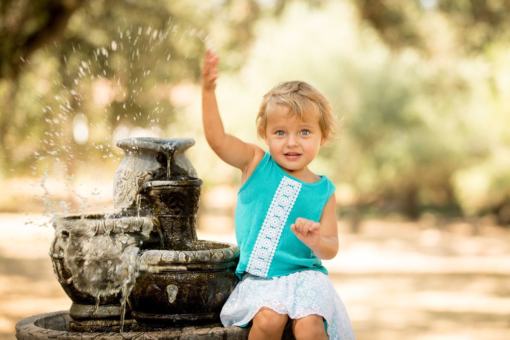 Girl playing with water