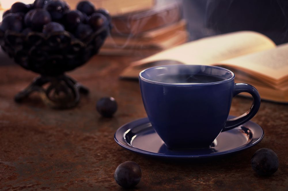 Blue cup of hot tea