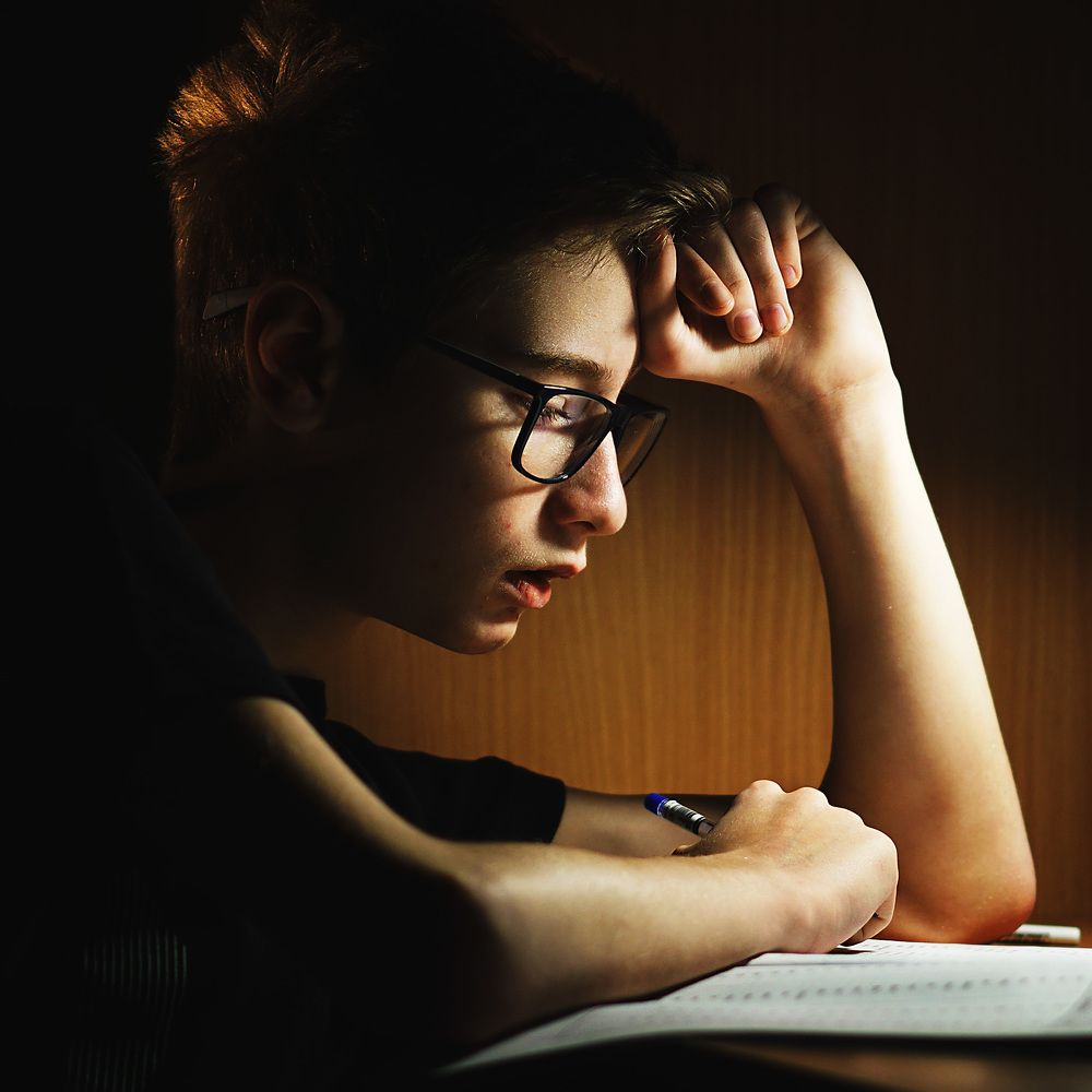 За уроками.