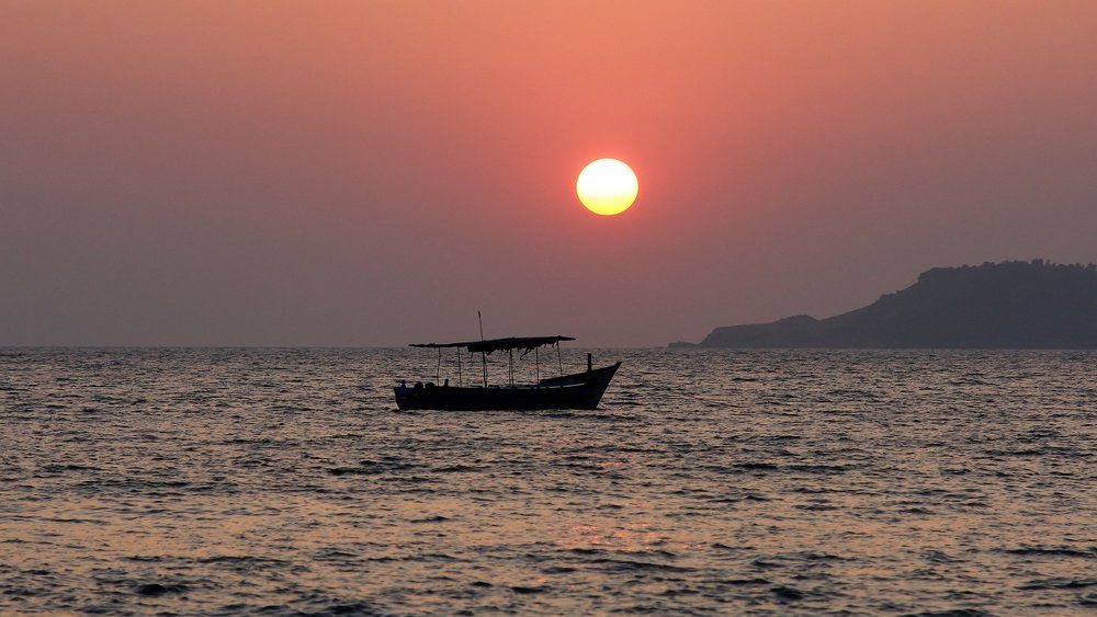 Закат на Богмоло Бич.