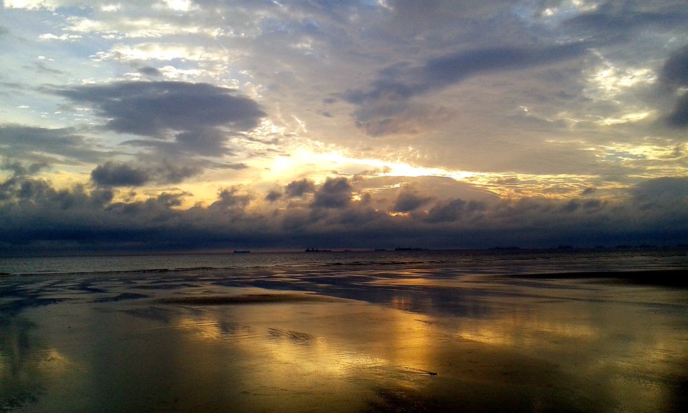 Reflection of Sun on Beach