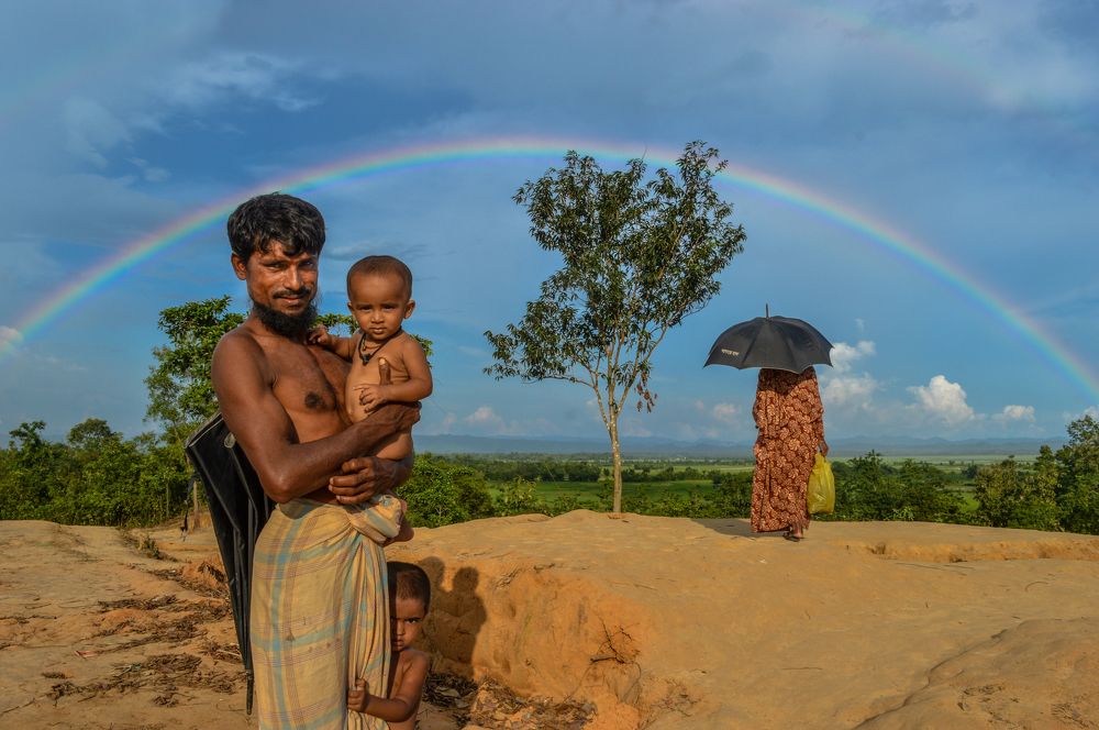 Rohinga family under the rainbow