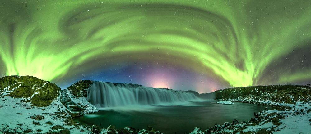 Northern lights over the Faxi waterfall