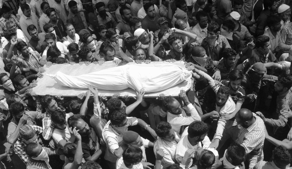 Kashmir continues to be in grip of violence after ATM guard is found filled with 300 pellets